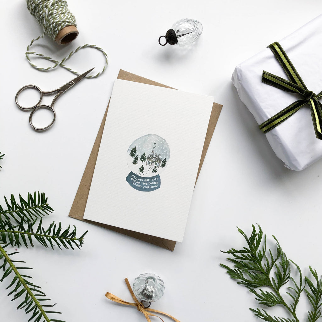 hand illustrated snow globe christmas card with envelope