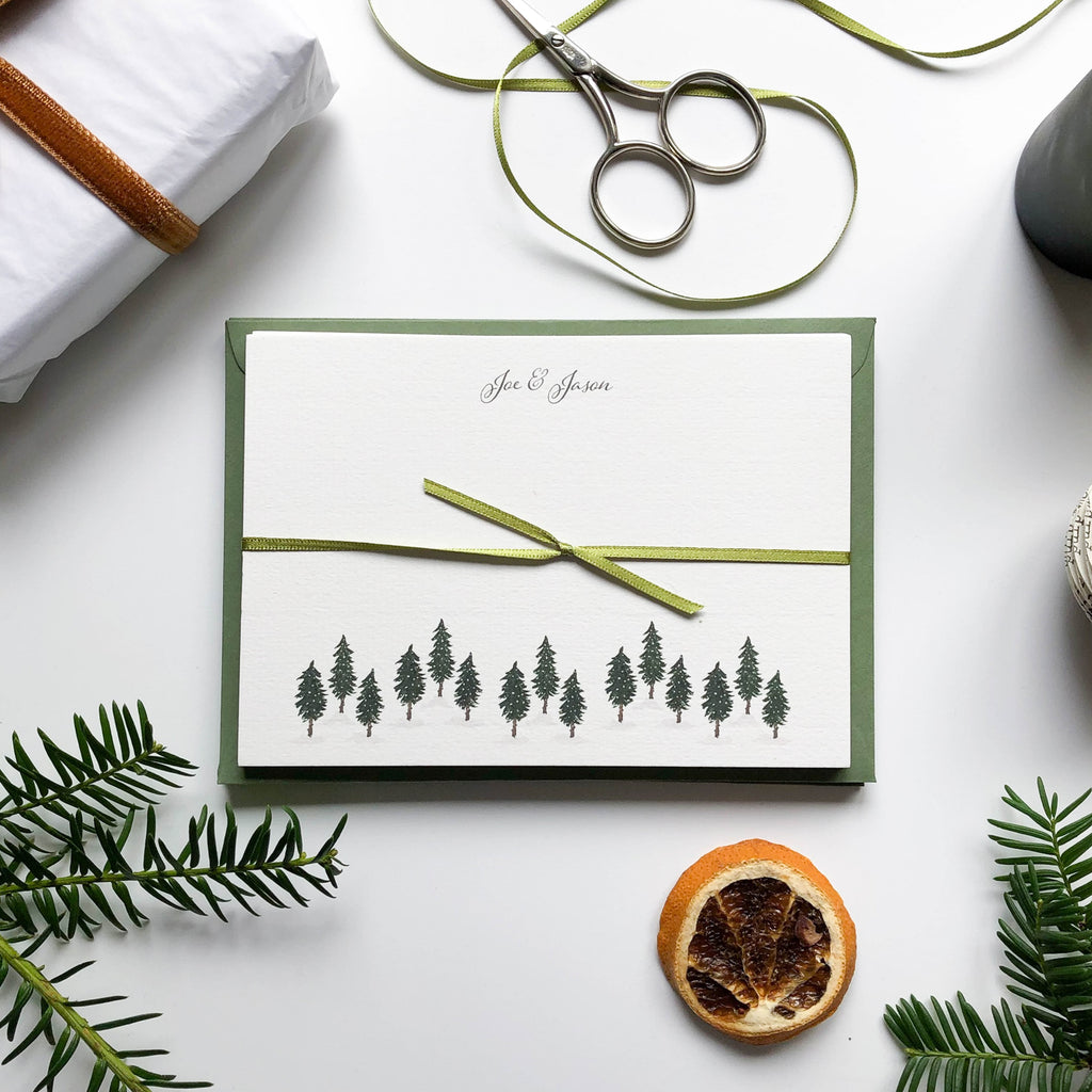 personalised christmas winter pine forest flat notecard set wrapped in ribbon