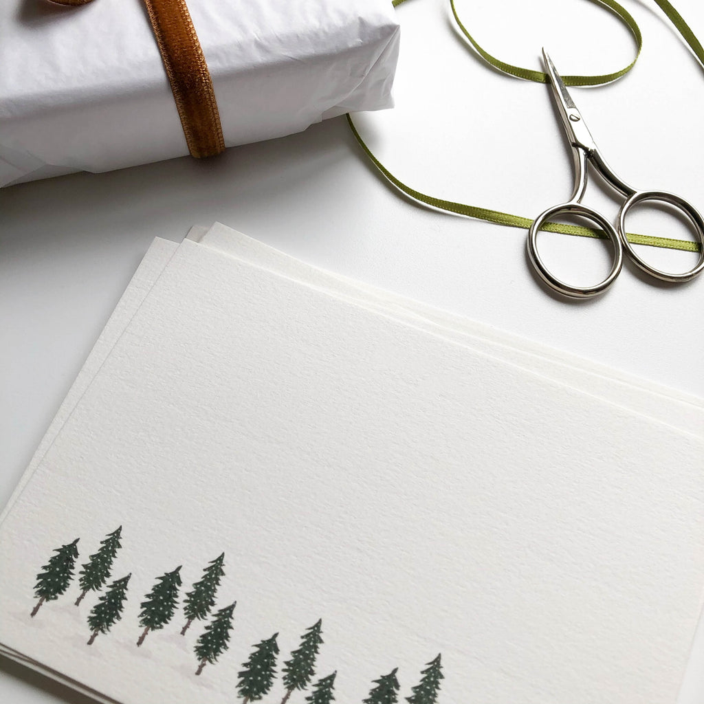 hand illustrated flat notecards with christmas pine forest close up